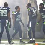 From left, Seattle Seahawks cornerback Brandon Browner, free safety Earl Thomas, strong safety Kam Chancellor and cornerback Richard Sherman are introduced before the first half of an NFL preseason football game, Thursday, Aug. 29, 2013, in Seattle. (AP Photo/Stephen Brashear)
