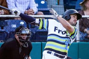 AquaSox's Austin Shenton watches a hit resulting in a home run Wednesday evening against the Tri-City Dust Devils at Funko Field in Everett on July 14, 2021. (Kevin Clark / The Herald)