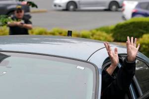An instructor playing the role of a suspect in a vehicle sticks her hands out of a car door during a training class at the Washington state Criminal Justice Training Commission, Wednesday, July 14, 2021, in Burien, Wash. Washington state is embarking on a massive experiment in police reform and accountability following the racial justice protests that erupted after George Floyd's murder last year, with nearly a dozen new laws that took effect Sunday, July 25, but law enforcement officials remain uncertain about what they require in how officers might respond — or not respond — to certain situations, including active crime scenes and mental health crises. (AP Photo/Ted S. Warren)