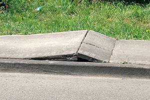 A section of sidewalk along Marine Drive in Tulalip buckled under the 100-degree heat in late June. (Snohomish County Public Works)