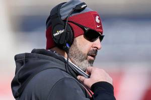 Washington State head coach Nick Rolovich looks on during the first half of an NCAA college football game against Utah, Saturday, Dec. 19, 2020, in Salt Lake City. (AP Photo/Rick Bowmer)