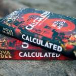 Nova McBees book Calculated, the first book in her three part series. (Olivia Vanni / The Herald)