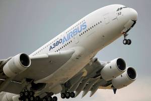FILE - In this June 18, 2015, file photo, an Airbus A380 takes off for its demonstration flight at the Paris Air Show in Le Bourget airport, north of Paris. European planemaker Airbus reports that it made 1.87 billion euros profit in the second quarter. That's a relief after a loss in the same quarter a year ago during the depths of the pandemic shutdowns and travel restrictions. (AP Photo/Francois Mori, File)