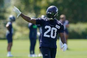 Seattle Seahawks running back Rashaad Penny waves to fans during NFL football practice Thursday, July 29, 2021, in Renton, Wash. (AP Photo/Ted S. Warren)