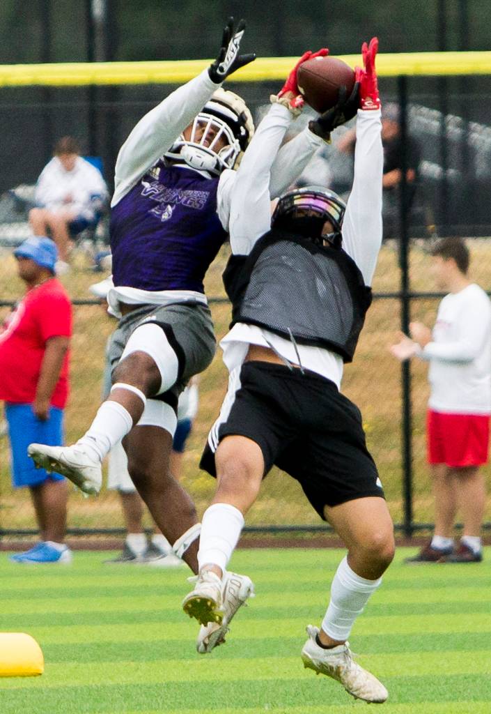Lake Stevens Trayce Hanks blocks a pass during the Cougars Championship Passing Tournament at Lakewood High School on July 31 in Arlington. (Olivia Vanni / The Herald)