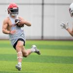 Stanwoods Ryder Bumgarner runs the ball in for a touchdown during the Cougars Championship Passing Tournament at Lakewood High School on July 31 in Arlington. (Olivia Vanni / The Herald)