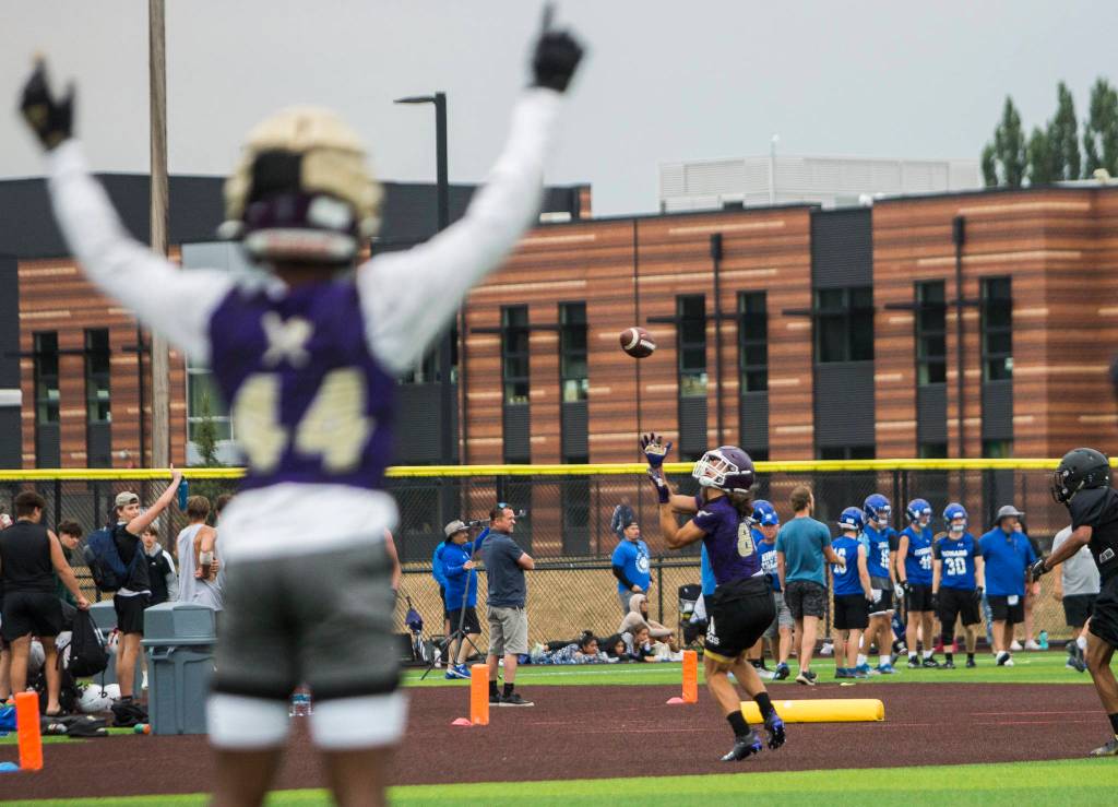 Lake Stevens Drew Carter makes a catch for a touchdown during the Cougars Championship Passing Tournament at Lakewood High School on July 31 in Arlington. (Olivia Vanni / The Herald)
