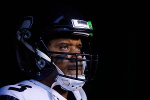FILE - In this Jan. 5, 2020, file photo, Seattle Seahawks Russell Wilson waits to run onto the field for the teams NFL wild-card playoff football game against the Philadelphia Eagles in Philadelphia. Speaking to the media for the first time since the end of last season, Wilson didnt care to talk about the game that’s helped make him famous. “To be honest with you, I don’t even want to talk about football right now,” Wilson said during a video conference Wednesday, June 3. "I can’t compare football to life and what the black community is going through right now,” he said. (AP Photo/Matt Rourke, File)