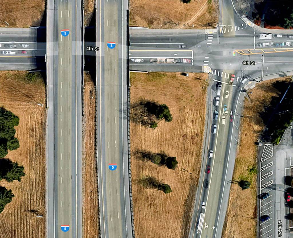 The northbound off-ramp from I-5 (right) where it intersects with Highway 528. (Google Maps)