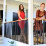 Real estate agents Randi Szakaly and Carole Falleen at a listing in Mukilteo. (Kevin Clark / The Herald)