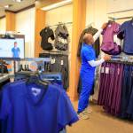 Vinson Latimore, owner and CEO of Choices Scrubs + Medical in Everett. (Kevin Clark / The Herald)