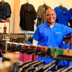 Vinson Latimore, owner and CEO, Choices Scrubs + Medical is a Bellingham-based company that sells medical supplies and scrubs to healthcare workers at his recently opened shop Wednesday afternoon in Everett on July 28, 2021.  (Kevin Clark / The Herald)
