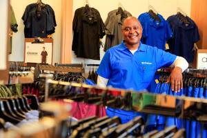 Vinson Latimore, owner and CEO, Choices Scrubs + Medical is a Bellingham-based company that sells medical supplies and scrubs to healthcare workers at his recently opened shop Wednesday afternoon in Everett on July 28, 2021.  (Kevin Clark / The Herald)