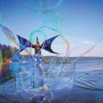 Stilt wizard Larry Dobson seemingly walks on water. (Photo by David Welton)