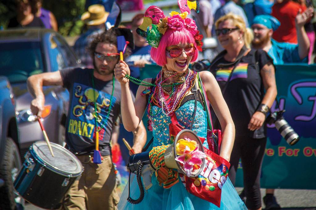 All the colors of the rainbow at the Pride Parade in Langley. This photograph was the basis of a vinyl wrap on the Sea-Tac shuttle. (Photo by David Welton)