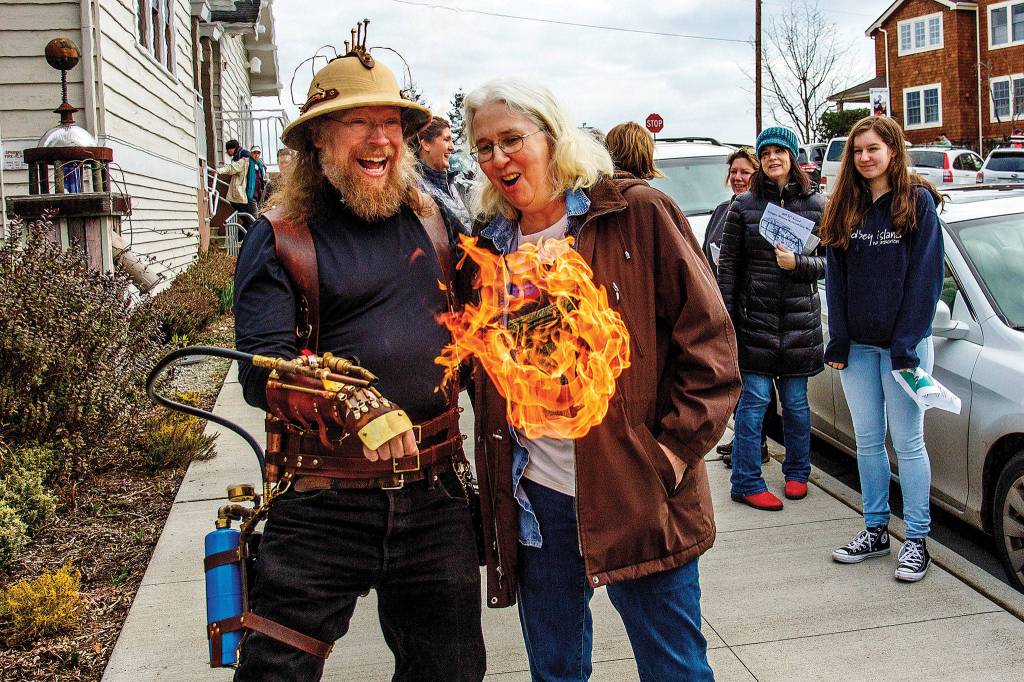 Mad Matt demonstrates his steam-punk fire-arm at Mystery Weekend in Langley. (Photo by David Welton)
