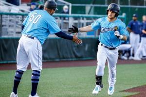 AquaSox's Kaden Polcovich rounds third base after a home run Thursday evening at Funko Field in Everett on June 3, 2021. (Kevin Clark / The Herald)