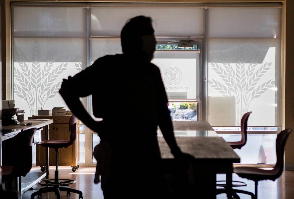 Washington State University Bread Lab Director Stephan Jones speaks during a tour with U.S. Trade Representative Katherine Tai and members of Congress in Burlington on Thursday. (Olivia Vanni / The Herald)