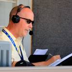 AquaSox broadcaster Pat Dillon calls the action on the field during a game against the Emeralds on July 28, 2021, at Funko Field in Everett. (Kevin Clark / The Herald)