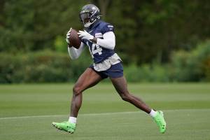 Seattle Seahawks wide receiver DK Metcalf makes a catch during NFL football practice Saturday, July 31, 2021, in Renton, Wash. (AP Photo/Ted S. Warren)