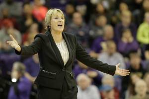 Washington State head coach June Daugherty calls to her team in the second half of an NCAA college basketball game against Washington, Saturday, Jan. 23, 2016, in Seattle. (AP Photo/Ted S. Warren)