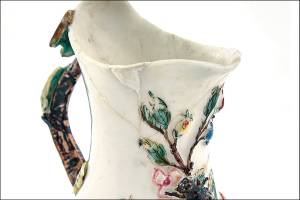 The "Goat and Bee" milk jug with incised triangle and script Chelsea mark, 1745-49, sold at Doyle for $3,780. (Cowles Syndicate Inc.)