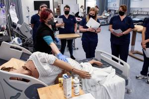 Catherine Robinweiler leads the class during a lab session at Edmonds College on April 29, 2021.
(Kevin Clark / The Herald)