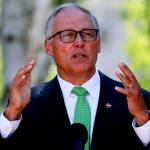 Gov. Jay Inslee speaks at a news conference where he announces COVID-19 vaccine mandate for Washington state employees and health-care workers, Monday, Aug. 9, 2021 in Seattle. (Ken Lambert/The Seattle Times via AP)
