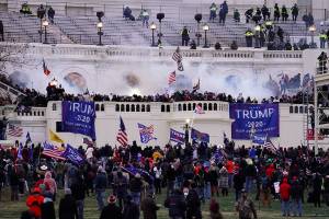 Violent protesters, loyal to President Donald Trump, storm the Capitol in Washington on Jan. 6, 2021. (AP Photo/John Minchillo, File)