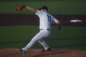Aquasox's Tim Elliott winds up as he pitches in the first inning as the Everett Aquasox beat the Tri-City Dust Devils in a home opening game at Funko Field on Tuesday, May 11, 2021 in Everett, Washington.  (Andy Bronson / The Herald)