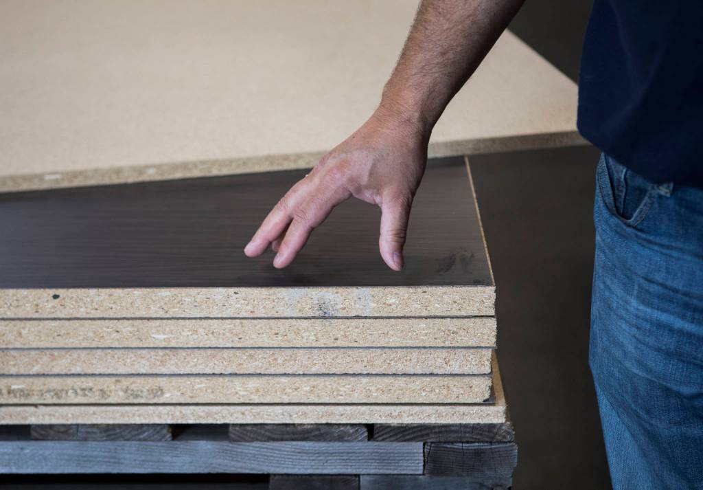 Ironwood general manager Tom Deady talks about the materials used to create upscale privacy doors. (Olivia Vanni / The Herald)