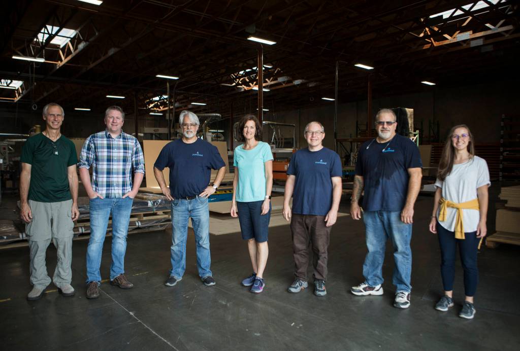 Part of the Ironwood Manufacturing team at their new Arlington on Friday, Aug. 13, 2021. (Olivia Vanni / The Herald)