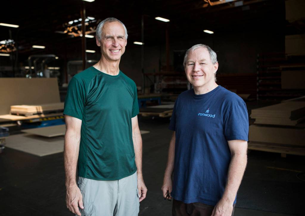 Two of Ironwood Manufacturings four owners at the new Arlington location. From left: Mark Neilsen and Trey Clasen. (Olivia Vanni / The Herald)