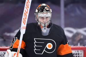 Philadelphia Flyers goaltender Carter Hart in action during an NHL hockey game against the Buffalo Sabres, Sunday, April 11, 2021, in Philadelphia. (AP Photo/Derik Hamilton)