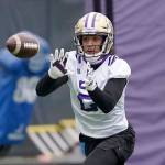 Washington defensive back Kyler Gordon makes a catch during the first day of NCAA college football practice for the team Wednesday, April 7, 2021, in Seattle. (AP Photo/Ted S. Warren)