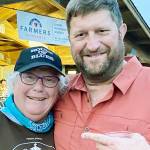 Carolyn “Dode” Carlson with Alex Crocco who is ahead by seven votes for second place for a chance at Mukilteo City Council in the general election. (Contributed photo)