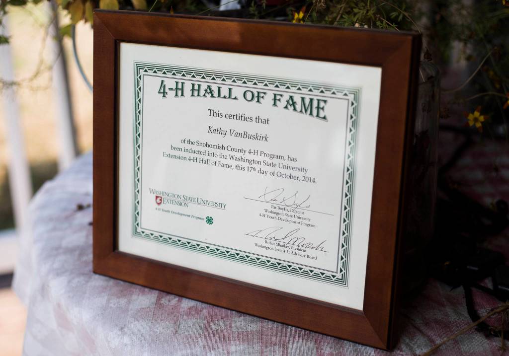 A 4-H Hall of Fame plaque awarded to Kathy Van Buskirk in 2014. (Olivia Vanni / The Herald)