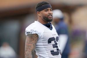 Seattle Seahawks safety Jamal Adams stretches before an NFL football practice, Tuesday, Aug. 17, 2021, in Renton, Wash. The Seahawks signed Adams to a four-year contract extension Tuesday that is expected to make the former All-Pro the highest-paid safety in the NFL. (AP Photo/Ted S. Warren)