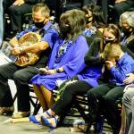 Family members attend the memorial service for Officer Charlie Joe Cortez Tuesday afternoon at the Angel of the Winds Arena in Everett on August 17, 2021.  (Kevin Clark / The Herald)