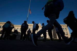 Students walk round to find their schedules and get checked in during the first day of school at Everett High on Monday, April 19, 2021 in Everett, Washington.  (Andy Bronson / The Herald)