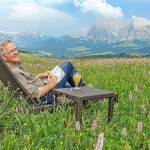 The Dolomites are ideal for hiking … or thinking about hiking. (Rick Steves Europe)