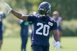 Seattle Seahawks running back Rashaad Penny waves to fans during NFL football practice Thursday, July 29, 2021, in Renton, Wash. (AP Photo/Ted S. Warren)