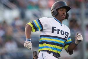 Aquasox's Kennie Taylor watches the ball as he hits a triple and drives in two runs as the Everett Aquasox beat the Vancouver Canadians 11-6 at Funko Field on Tuesday, Aug. 10, 2021 in Everett, Washington.  (Andy Bronson / The Herald)