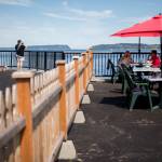 People dine at the table additions at the parklet for Ivars on Aug. 5. (Olivia Vanni / Herald file)