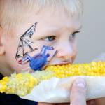 Kevin Clark / The Herald

Lincoln Pillar, 4, partakes of the corn on the cob on the first day of the annual Evergreen State Fair.