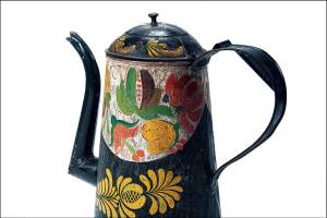This 19th-century 10-inch-high painted tin coffeepot sold in a Cowan auction for $544. (Cowles Syndicate Inc.)