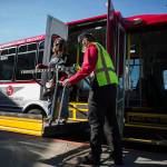 Leigh Spruce gets off of Everett Para Transit at the Everett Mall on Thursday, March 11, 2021 in Everett, Wa. (Olivia Vanni / The Herald)