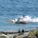 A small plane crash lands in the water near Edmonds on April 26, 2021. (Julia Wiese/MyEdmondsNews)