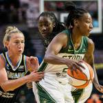 Seattle Storm’s Jewell Loyd has her jersey grabbed by at Chicago Sky’s Courtney Vandersloot during the game at Angel of the Winds Arena on Friday, Aug. 27, 2021 in Everett, Wash. (Olivia Vanni / The Herald)