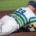 AquaSox's Tyler Keenan dives for the ball during the game against the Dust Devils on Sunday, May 16, 2021 in Everett, Wash.